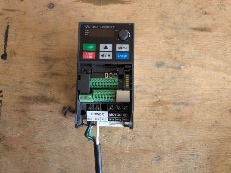 Fork connectors fastened to power cord wires