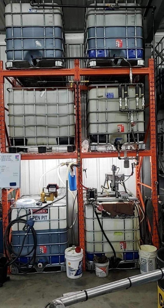 Example gravity-feed shelving setup with stacked IBC totes