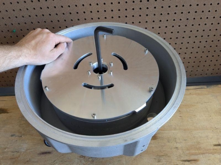 Loosening the bowl nut with an 8mm Allen wrench